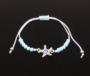 D. JJ EVIL EYE STARFISH TURQUOISE